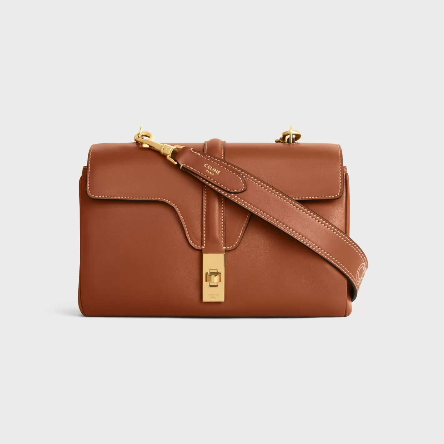 Shop CELINE Long Strap in smooth CALFSKIN WITH EMBROIDERY with Gold Finishing TAN